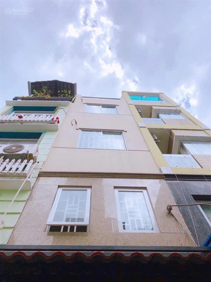Bán nhà mặt tiền 5 tầng. xe hơi đỗ cửa ngay trên trục đường vĩnh hội