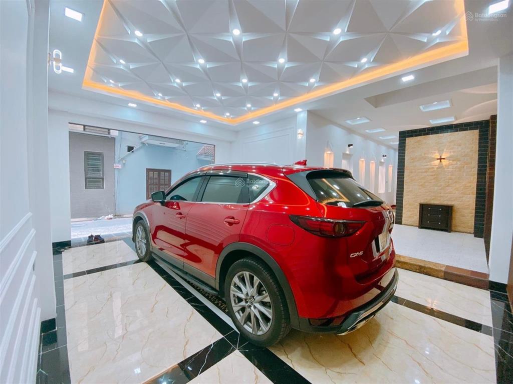 Bán nhà đường láng  7 tầng thang máy  2 mặt tiền  gara ô tô  dt 50m²  tặng nội thất  19.x tỷ