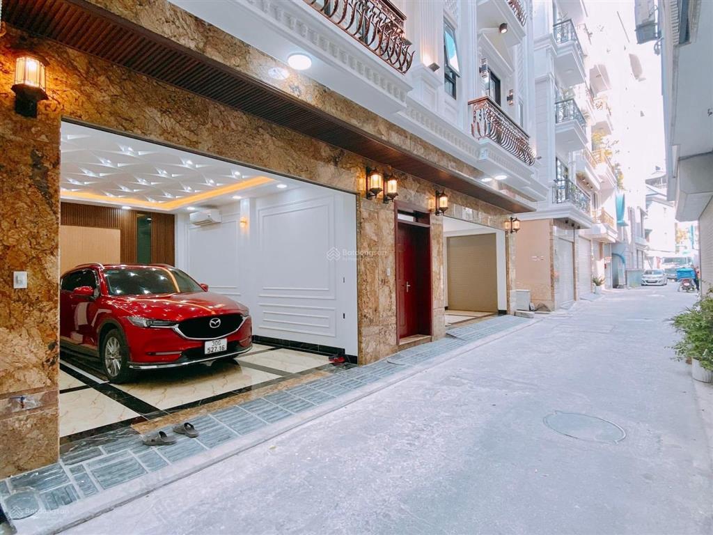 Bán nhà đường láng  7 tầng thang máy  2 mặt tiền  gara ô tô  dt 50m²  tặng nội thất  19.x tỷ