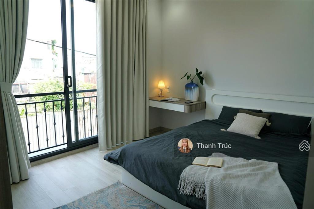 Bán nhà xây mới 3 lầu có thang máy ngay 520 quốc lộ 13 đối diện vạn phúc city