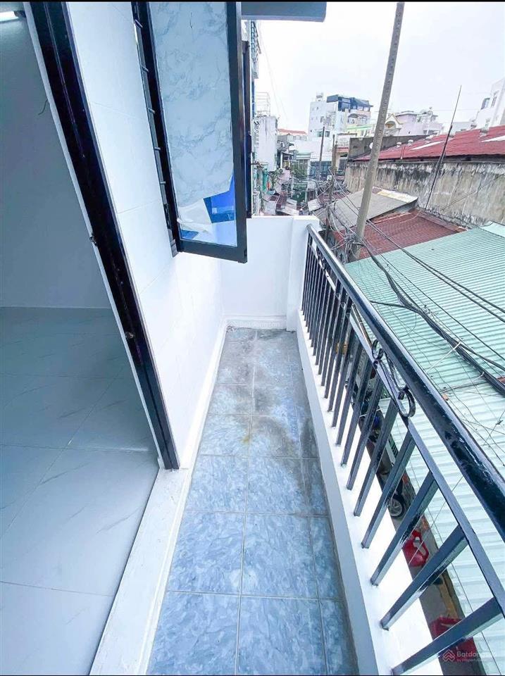 Bán nhà đẹp tại đội cung, hẻm xe hơi giá thương lượng 3,2 tỷ, 14.9m2, 2pn, 3wc, mặt tiền 5m