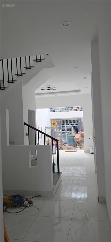 Cần tiền bán gấp nhà xây mới trệt lầu 2 mặt tiền xuân thới đông