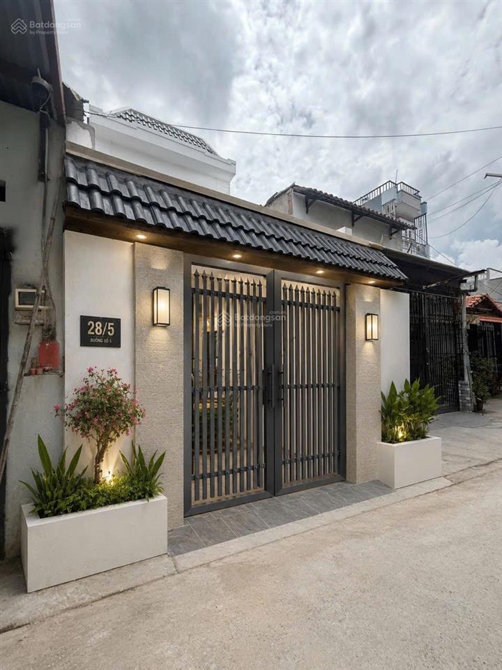 Cần tiền bán gấp nhà xây mới trệt lầu 2 mặt tiền xuân thới đông