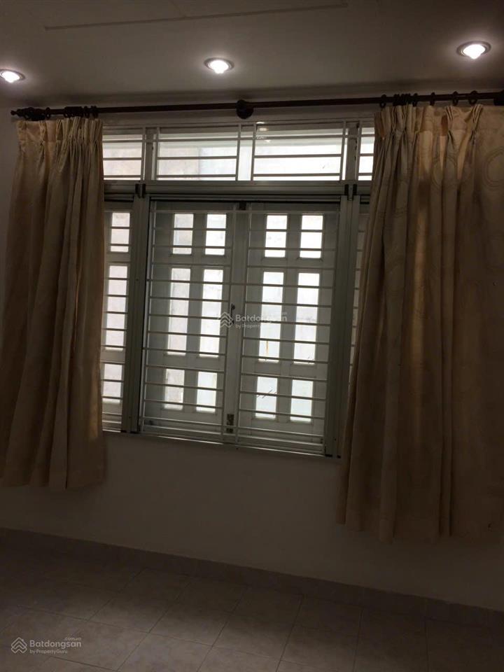 Bán đất tặng 2 căn nhà 1 trệt, 2 lầu, sân thượng, có 8 phòng cho thuê quận bình thạnh