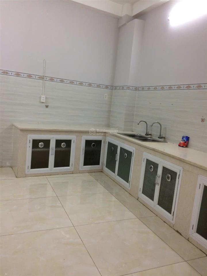 Bán đất tặng 2 căn nhà 1 trệt, 2 lầu, sân thượng, có 8 phòng cho thuê quận bình thạnh