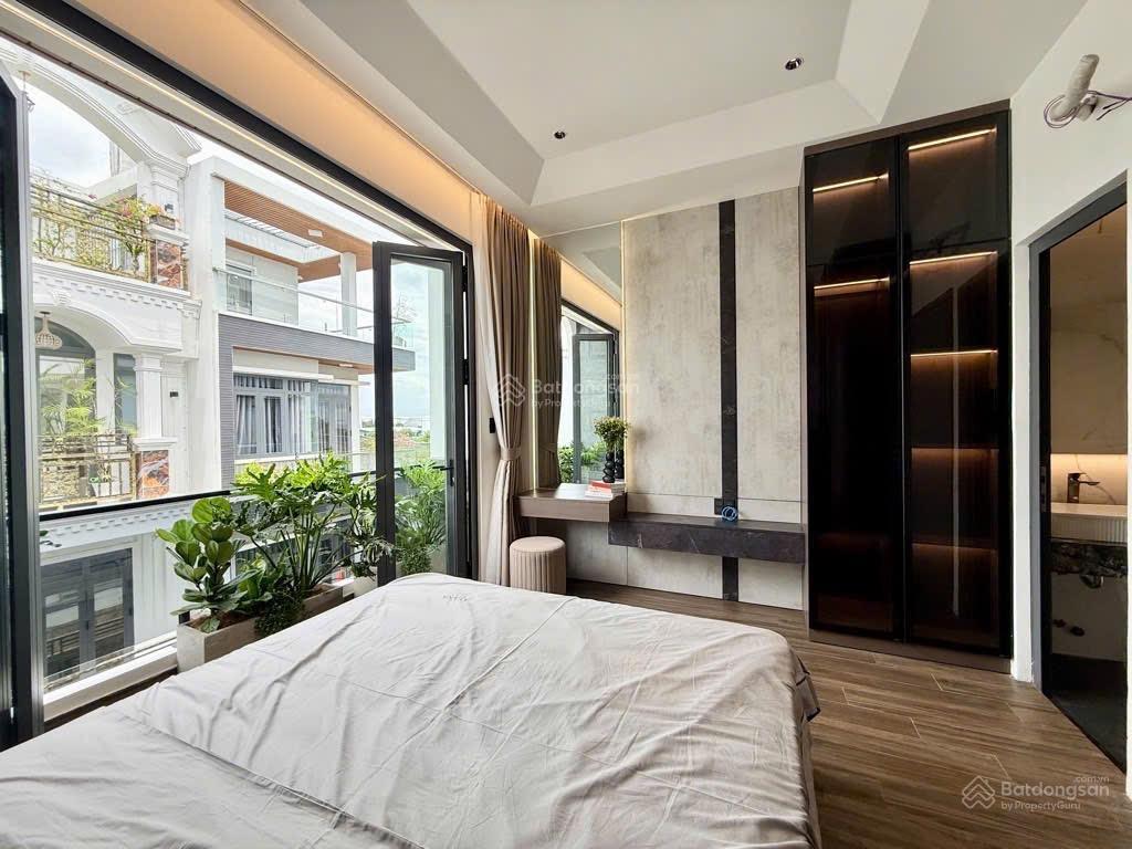 Nhà hẻm xe hơi  hồ biểu chánh phú nhuận  50m2 (4 x12,5)  4 tầng  chỉ 7,6 tỷ.