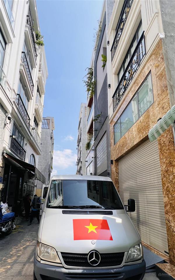 Phạm văn đồng, bình thạnh  xe hơi ngủ nhà  47m2  (4x11.5) 5 tầng hiện đại  hẻm nhựa 6m  9 tỉ