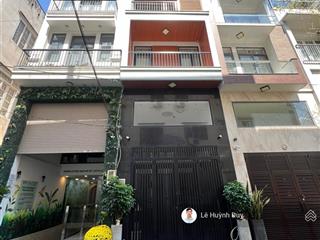 Tòa nhà 6 tầng  nguyễn văn đậu  71m2  phân lô  đường 8m  291m2 sàn  15,5 tỷ