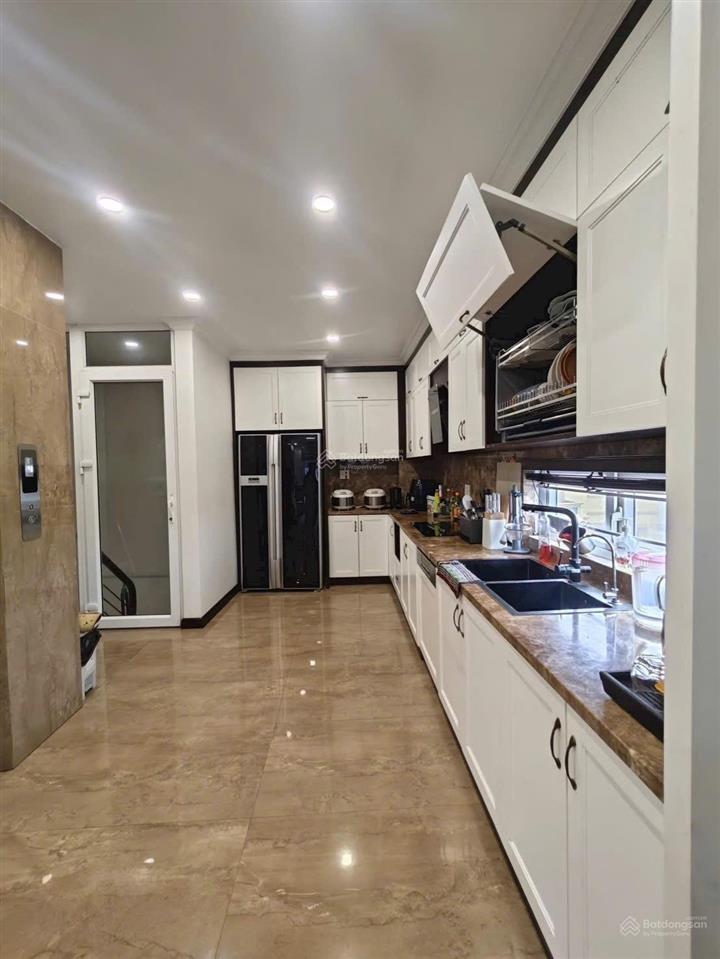 Bán nhà lô góc kd ngày đêm vỉa hè ô tô tránh, sát chợ trương định, 7 tầng thang máy