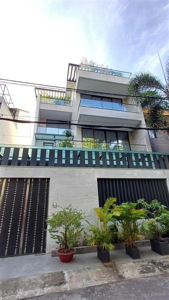 Biệt thự, hẻm 8m  trường sa, giáp q3  4 tầng, 7x12  cam kết chuẩn 100%