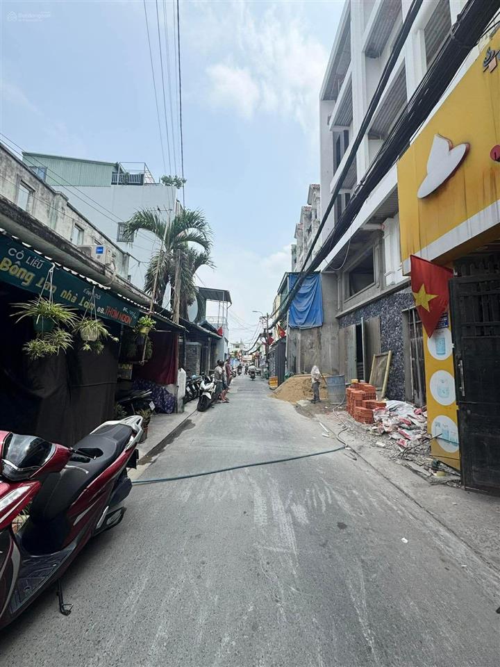 Hẻm xe hơi thông  nhà 4 tầng ở & kinh doanh