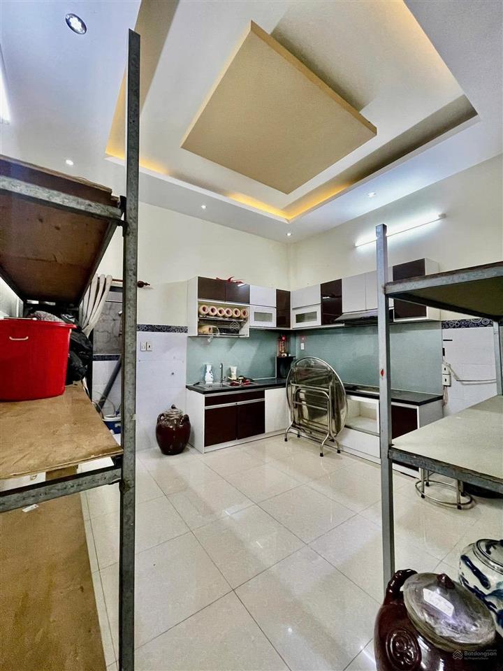Nhà 2 tầng xe hơi thông hương lộ 2  đất mới