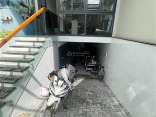 Nhà rộng đẹp mặt tiền đường 30m kdc an sương 1 hầm 4 lầu shr 4x25m