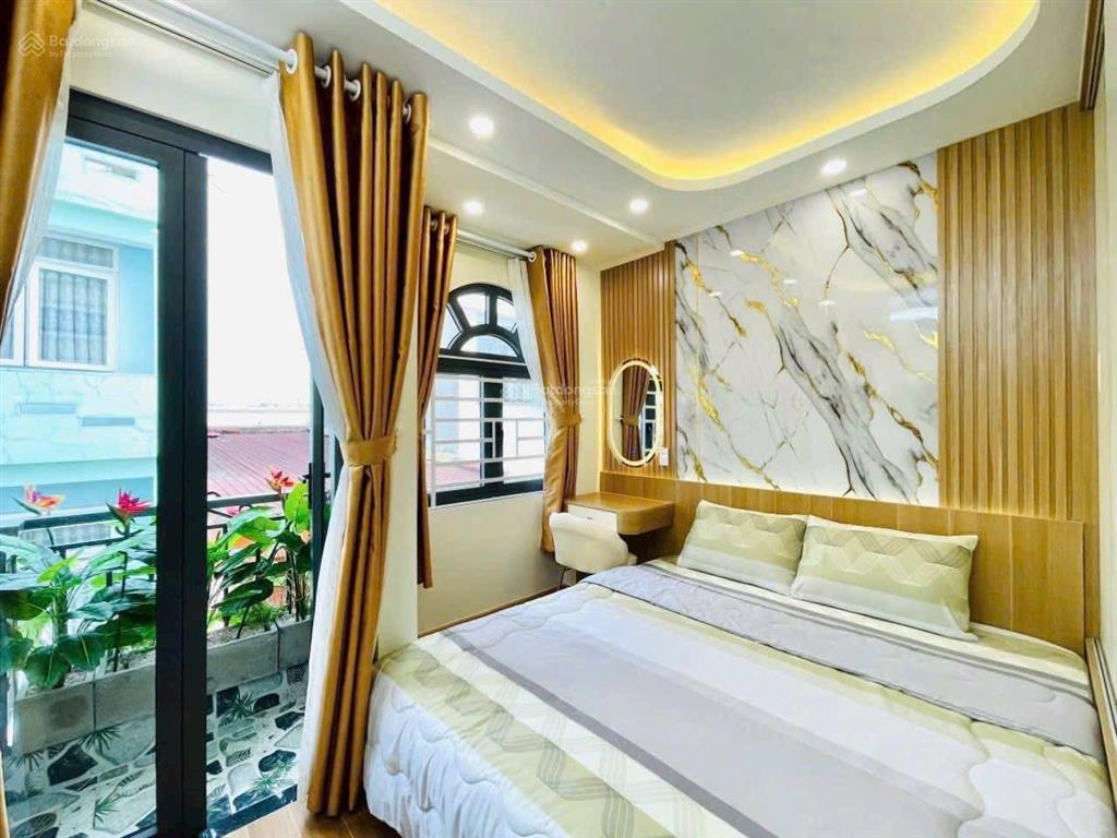 Nhà hxh kế bên phạm văn đồng. đ.trương đăng quế, p.3, gò vấp. dt40m2(4mx10m). shr 4pn 3wc