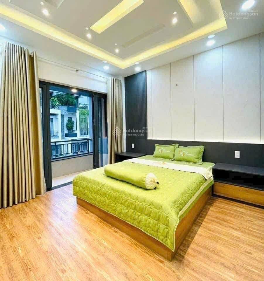 Nhà 5 tầng hẻm xe hơi nguyễn kiệm gần sân bay tsn 64m2