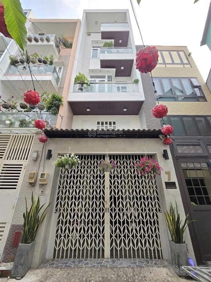 Nhà 5 tầng hẻm xe hơi nguyễn kiệm gần sân bay tsn 64m2