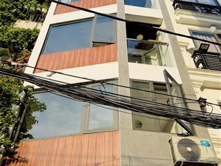 Hiếm nhà 5 tầng hxh quay đầu gần vincom & emart phan văn trị chỉ 7.x