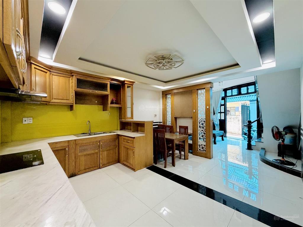 Bán đất tặng nhà 4 lầu gần vincom & emart phan văn trị