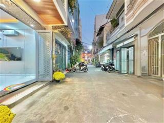 Gấp bán 11.7 giảm về 10,95 tỷ  bán nhanh nhà 4 tầng hẻm xe hơi vào tận nhà  lê văn sỹ gần chợ