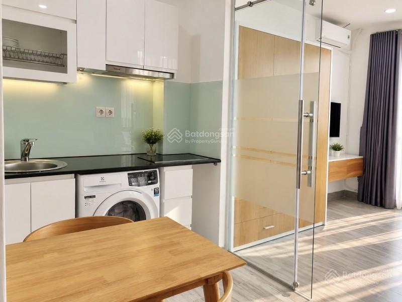 Quận 1  mt huyền quang  114,7m  27,9 tỷ  vay ls 9%/năm  13 chdv  dt 120tr/tháng