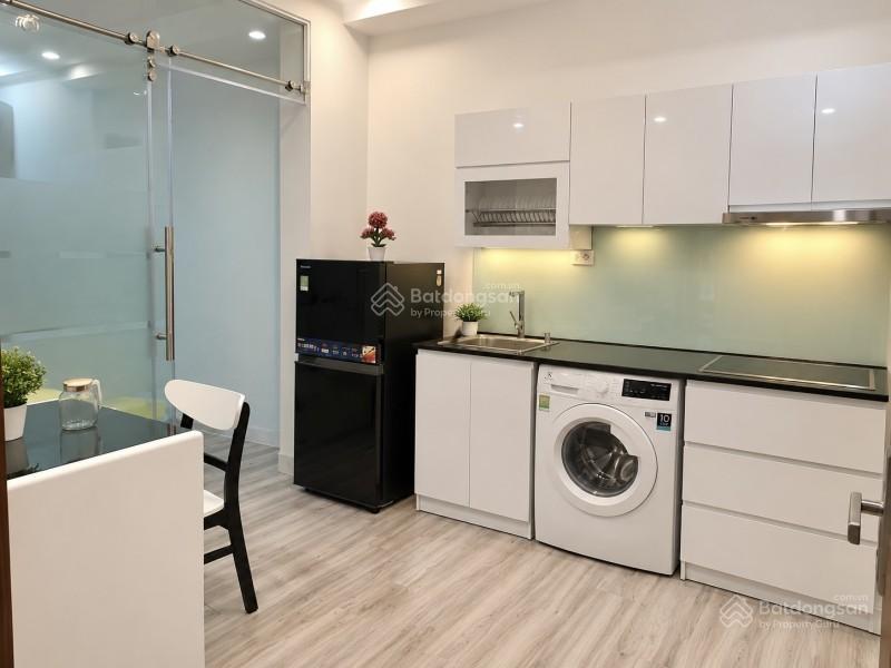 Quận 1  mt huyền quang  114,7m  27,9 tỷ  vay ls 9%/năm  13 chdv  dt 120tr/tháng