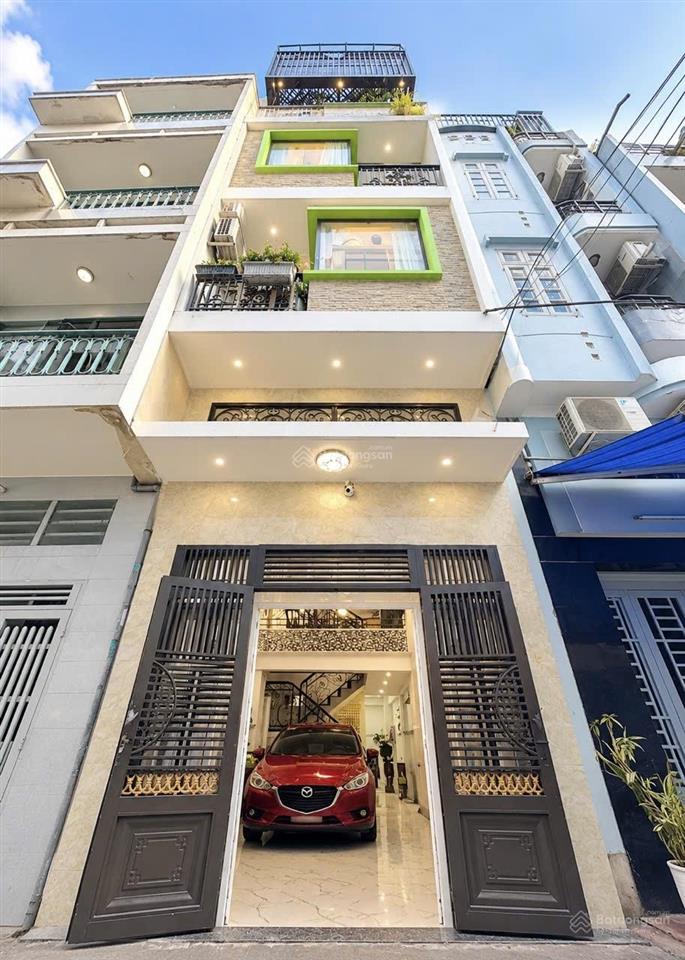 Nhà 14,3 tỷ, đường số, khánh hội, quận 4, 5 tầng, 40m (3,9x11m), ô tô đậu trong nhà.