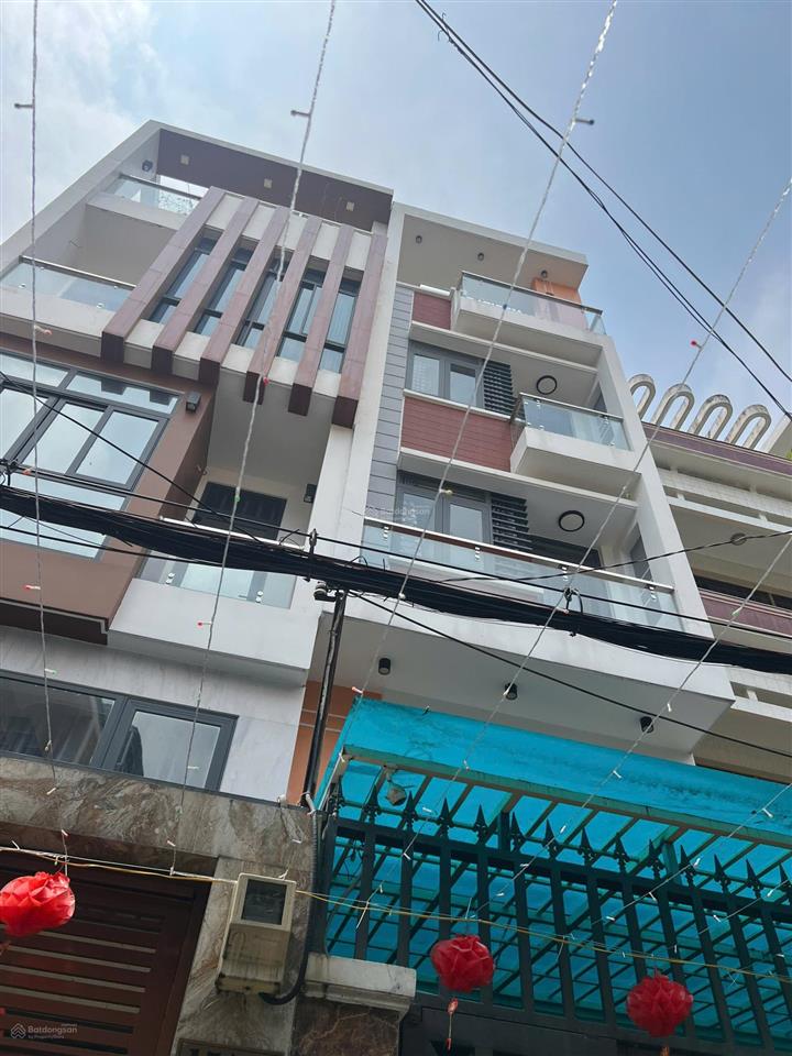 Hẻm oto vf3 khu phan xích long 5 tầng nhà còn mới 4pn sát mặt tiền