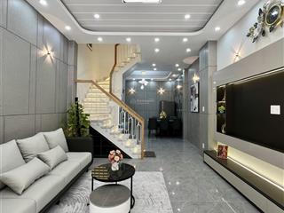 Nhà xây mới 4m x 10m 3 tầng 4 phòng ngủ gần ga t3 tân sơn nhất sát mặt tiền