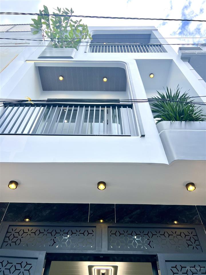 Nhà xây mới 3 tầng gần trường tân trụ cách 1 căn ra mặt tiền 4m x 12m 4 phòng ngủ sẵn nội thất
