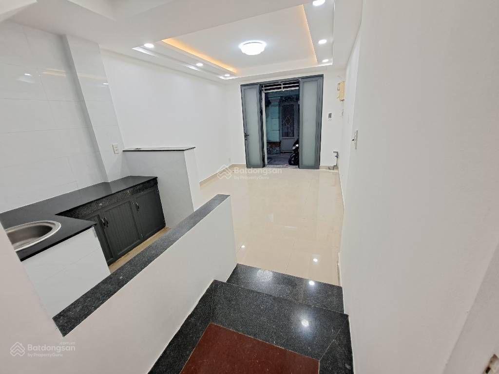 Nguyễn văn nguyễn q1  1 trệt 2 lầu  3,5x 7,4m nở hậu. 50m ra hoàng sa, hẻm thông