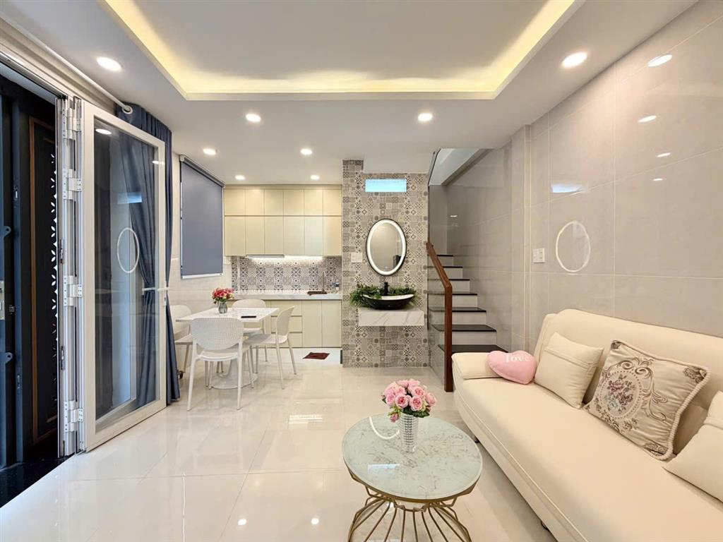 Sau lưng căn mặt tiền cô giang, phường 2, phú nhuận nhà đẹp 2 tầng full nội thất ngang 6m 5.8tỷ tl