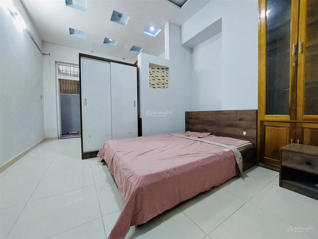 Chdv trần não q2  5 tầng 8p đường 12m xe hơi tránh thông tứ phía  ngay ven sông bình an 18 tỷ