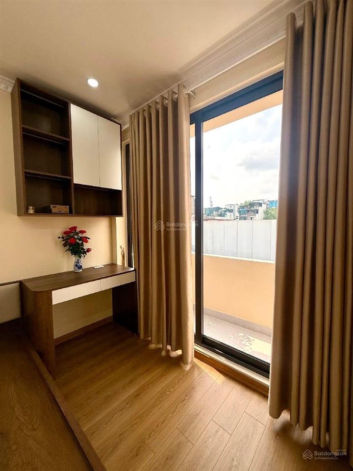 Mặt phố gần trần khát chân 6 tầng thang máy diện tích 51 m ô tô đỗ cửa kinh danhchào 23.tỷ