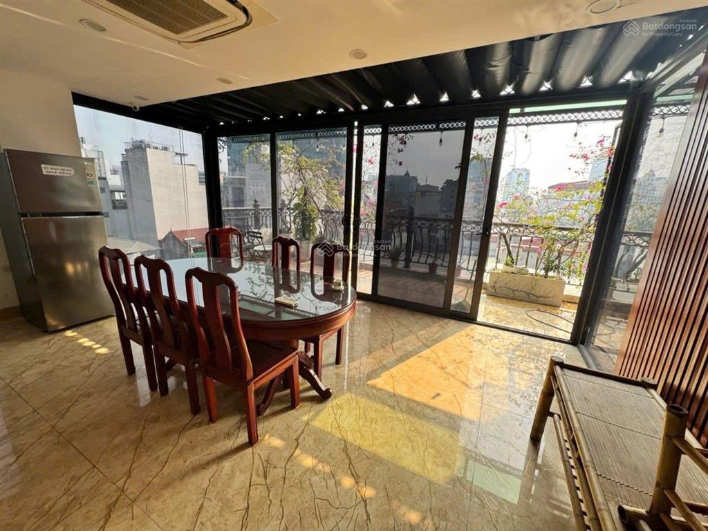Bán nhà phân lô ô tô hoàng cầu  đống đa 74/84m2, 8 tầng, lô góc, mt 7m, giá chào 35 tỷ
