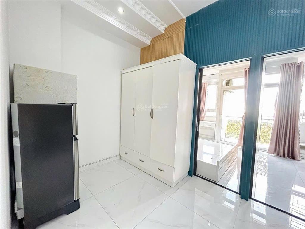 Cho thuê cc mini 2pn phú nhuận, 50m2 ban công, máy giặt riêng, ngay phan xích long giáp quận 1 3