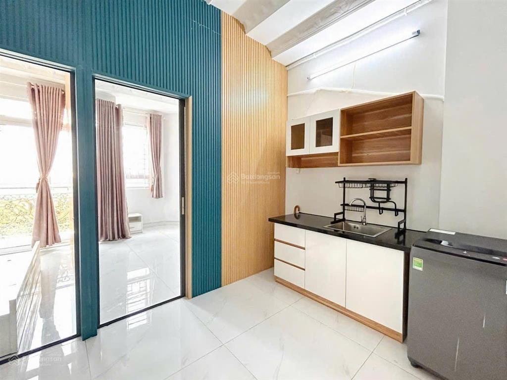 Cho thuê cc mini 2pn phú nhuận, 50m2 ban công, máy giặt riêng, ngay phan xích long giáp quận 1 3