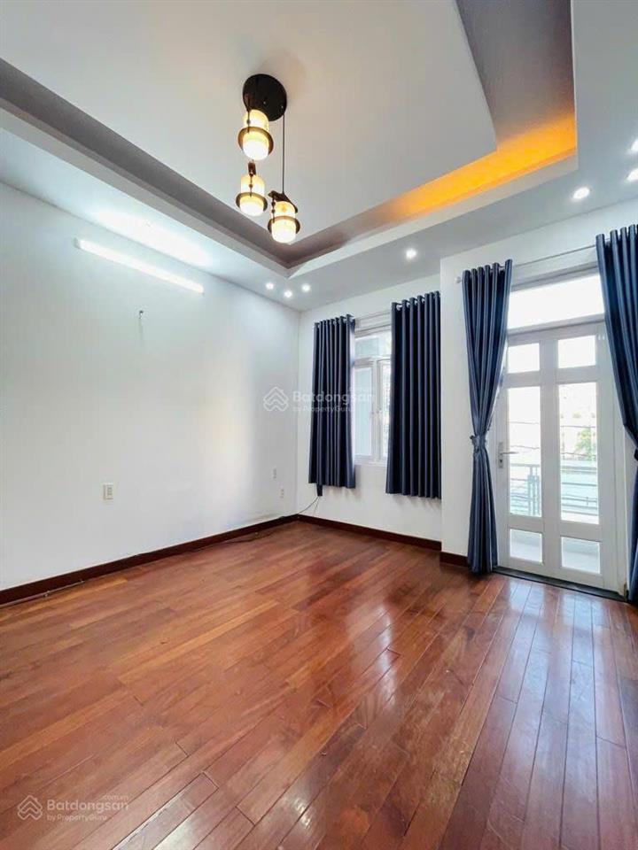 Bán nhà phan huy ích 4 tầng, 5pn, đường 8m có lề đi bộ ra emart  9 tỷ 2