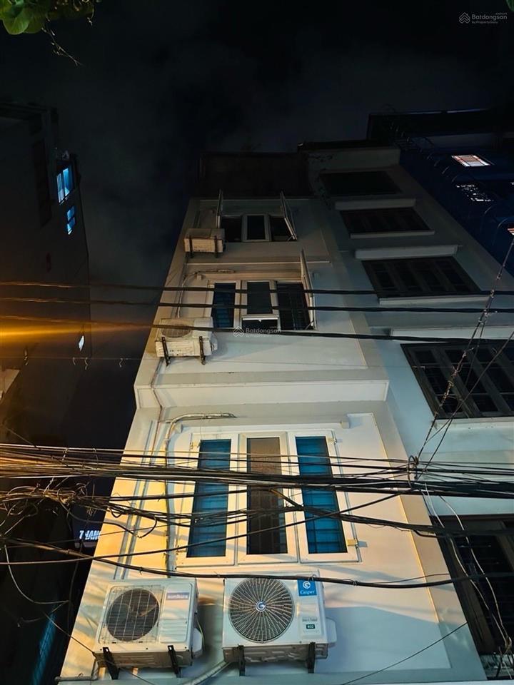 Nhà 5 tầng lô góc 50m trung tâm lê đức thọ nguyễn hoàng ô tô qua nhà giá tốt khu vực