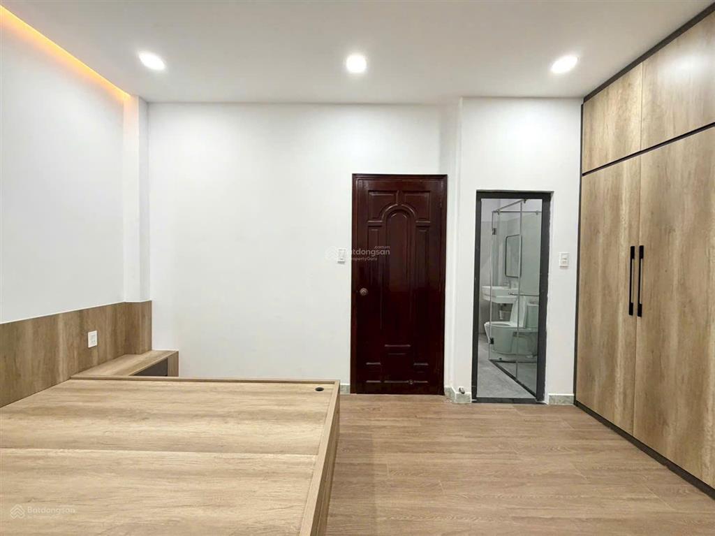 Cần bán nhà 5 tầng hẻm 48 hồ biểu chánh, phú nhuận  ngang 5m thoáng  khu an ninh. nhà mới ở ngay