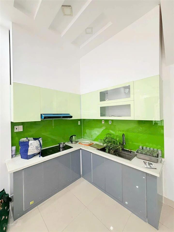 12.8 tỷ  cần bán nhà góc 2 mt hxh lê văn sỹ thông trường sa, quận 3  nhà 4 tầng