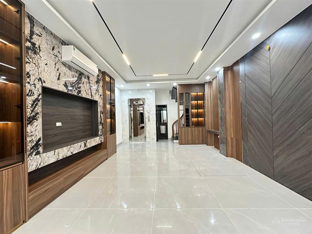 Bán nhà xã đàn, 40m² xây 6 tầng thang máy, ô tô đỗ, ngõ thông, full nội thất, không qh
