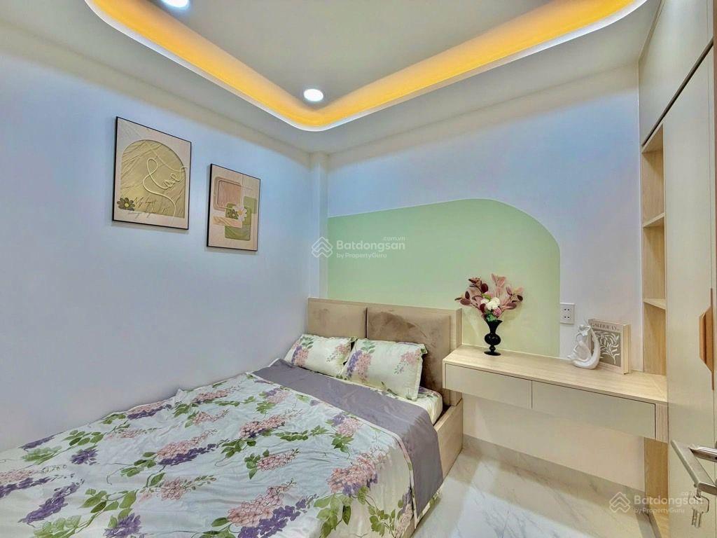 Sát mặt tiền lê quang định  4 tầng, 4 phòng ngủ, gần chợ bà chiểu, giá 7.4 tỷ