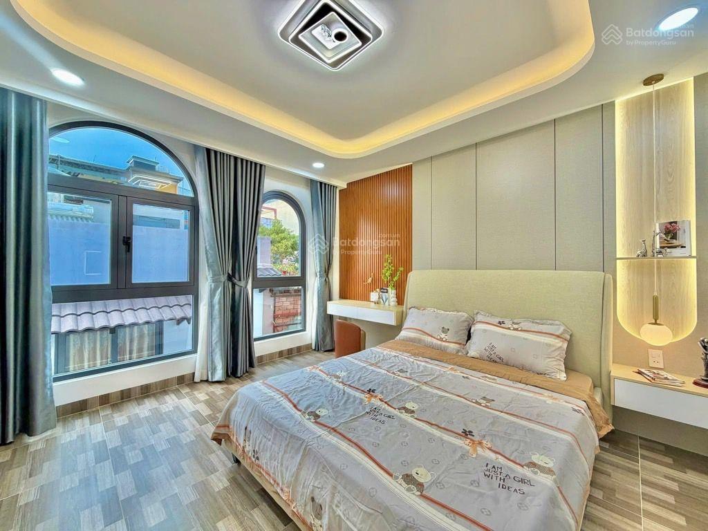 Sát mặt tiền lê quang định  4 tầng, 4 phòng ngủ, gần chợ bà chiểu, giá 7.4 tỷ