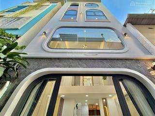 Sát mặt tiền lê quang định  4 tầng, 4 phòng ngủ, gần chợ bà chiểu, giá 7.4 tỷ