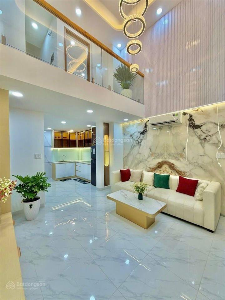 Sát mặt tiền lê quang định  4 tầng, 4 phòng ngủ, gần chợ bà chiểu, giá 7.4 tỷ