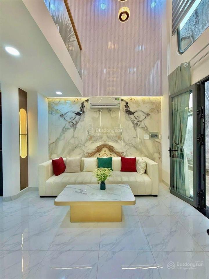 Sát mặt tiền lê quang định  4 tầng, 4 phòng ngủ, gần chợ bà chiểu, giá 7.4 tỷ