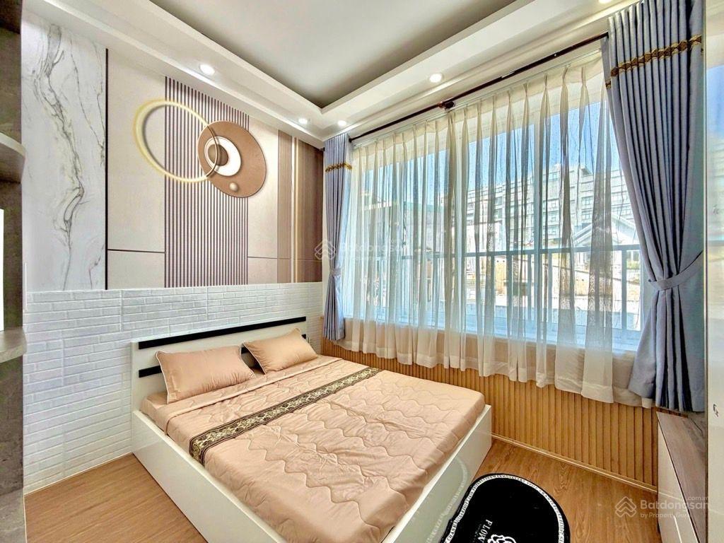 4 tầng btct 5 phòng ngủ  hẻm thông phan văn trị gần chợ bà chiểu