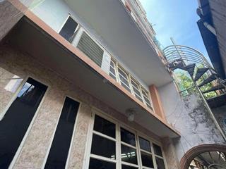 Nhà mt đoàn văn bơ  nguyễn tất thành 195m2. 1 đời chủ chưa qua đầu tư dòng tiền 50tr/ tháng