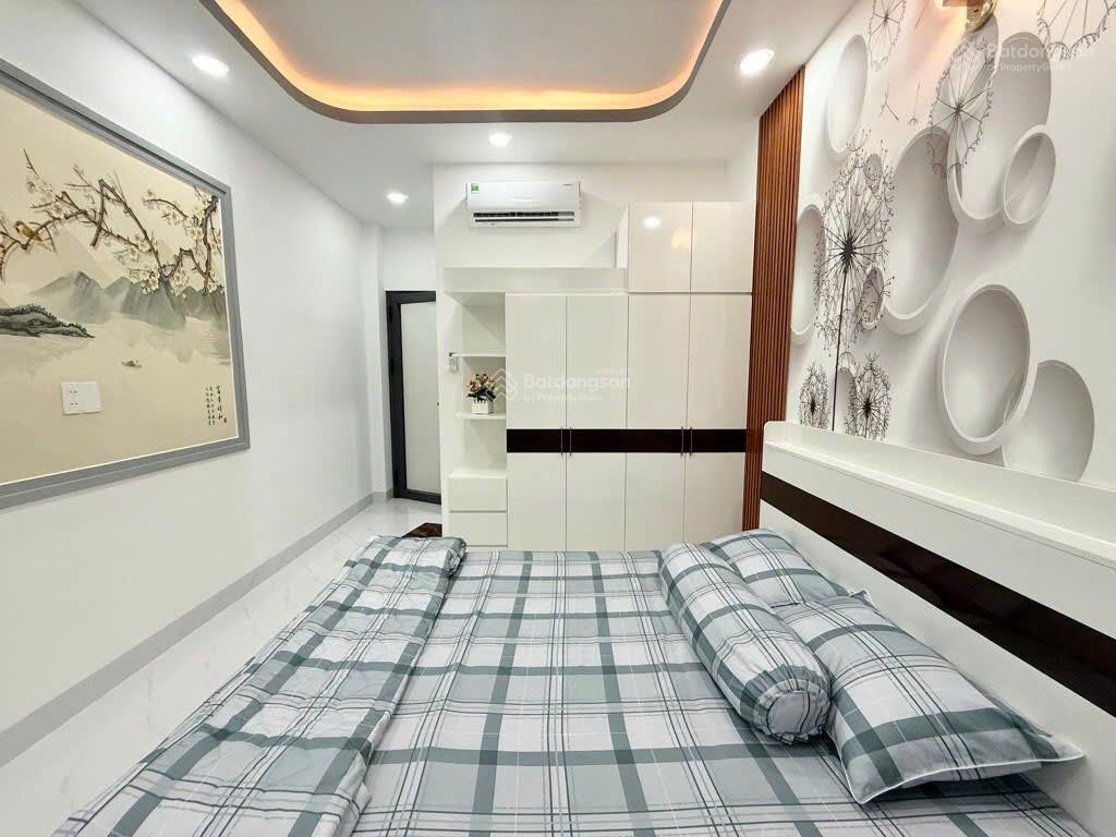 Nhà gò vấp giáp ranh pn  hẻm xe hơi 7 chỗ  50m2 (3.5x15)  4 tầng  nhà mới dọn vào ở ngay