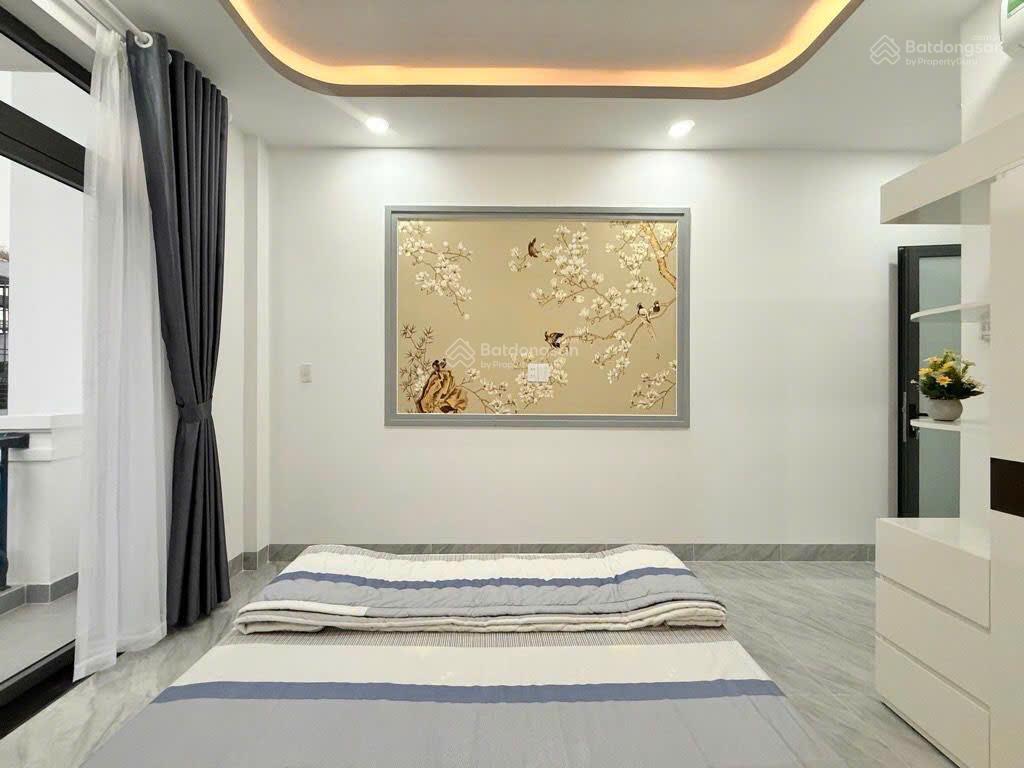 Nhà gò vấp giáp ranh pn  hẻm xe hơi 7 chỗ  50m2 (3.5x15)  4 tầng  nhà mới dọn vào ở ngay